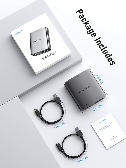 Lenovo USB-C adapter package with adapter, cables, and manual on a light gray background