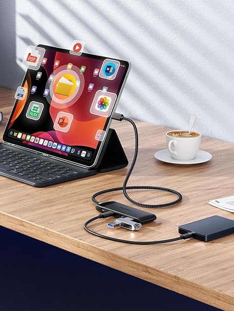 Tablet with keyboard and external hard drive on a desk