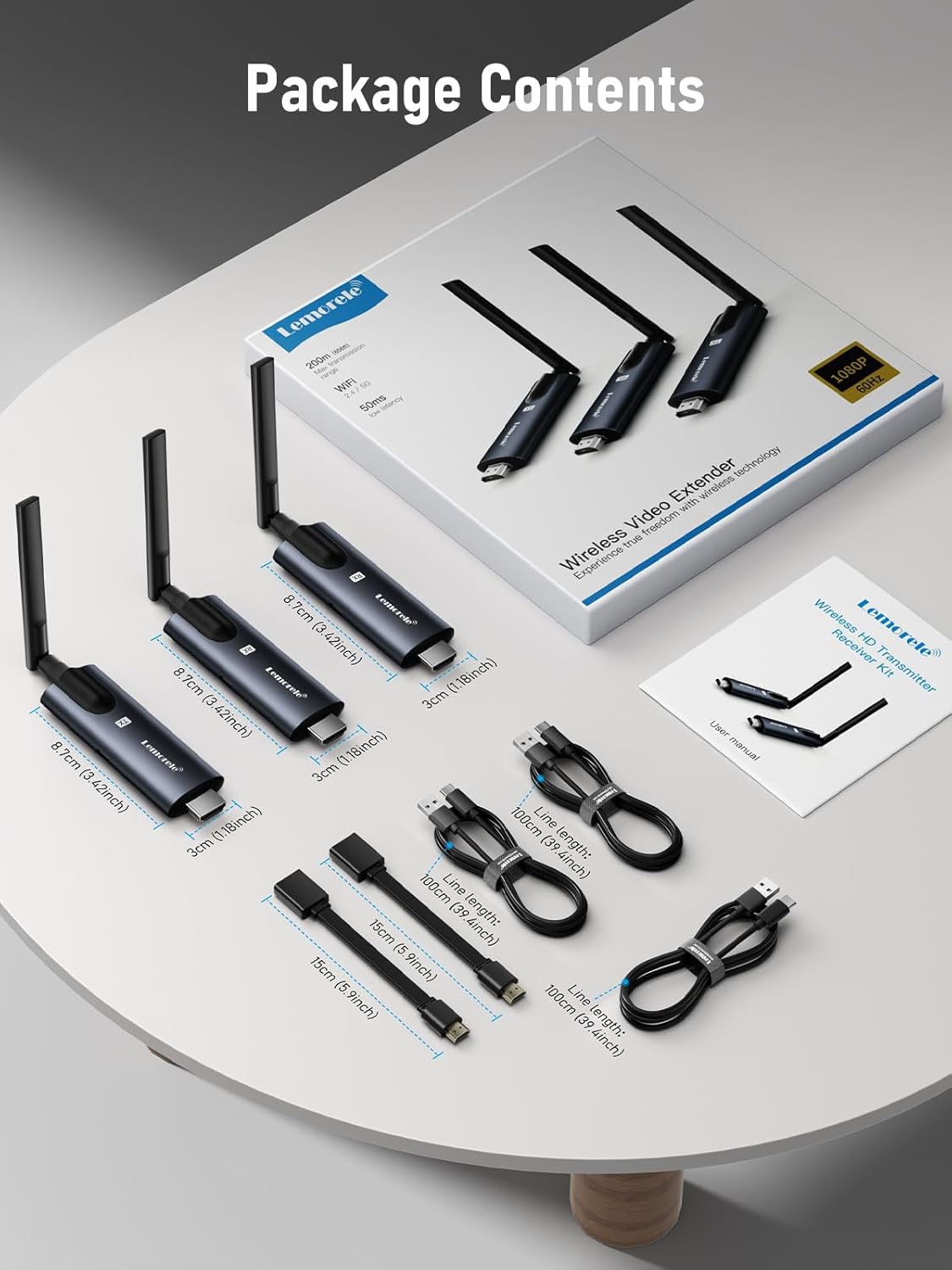 Package contents of a wireless video extender with various components on a white surface.