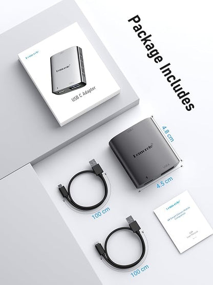 Lenovo USB-C adapter package with adapter, cables, and manual on a light gray background