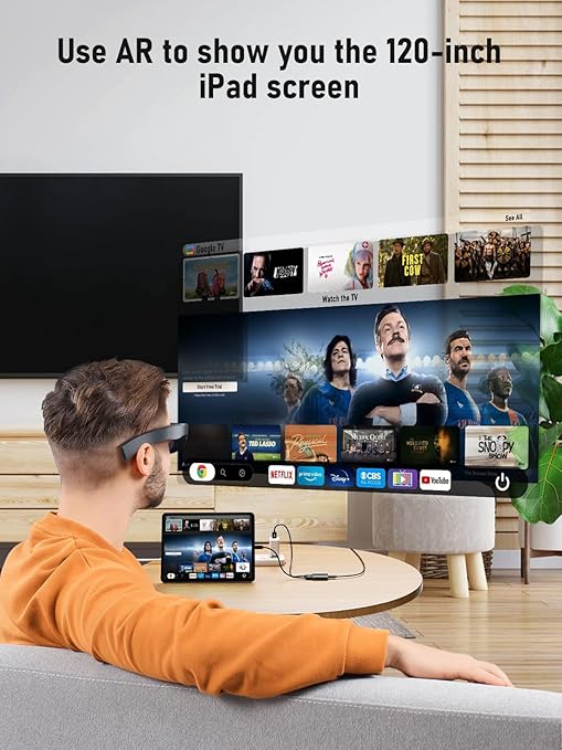 Person using augmented reality to display a 120-inch iPad screen on a large TV screen.