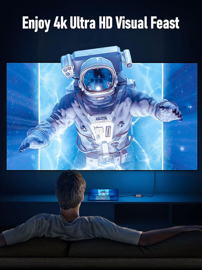 Person watching a 4k Ultra HD movie of an astronaut on a large screen.