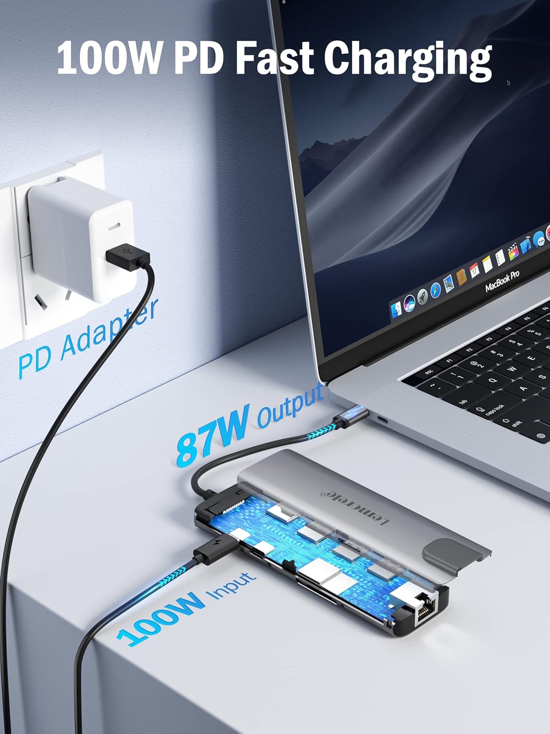 Laptop with USB-C adapter and power adapter, displaying 100W PD fast charging.