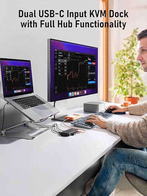 Person using a Dual USB-C Input KVM Dock with Full Hub Functionality at a desk.