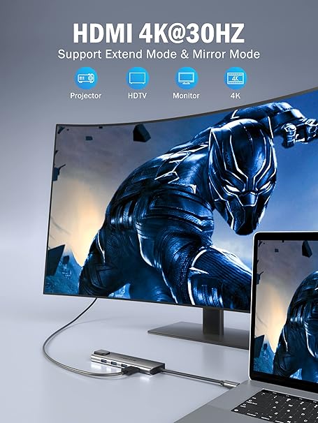 Monitor displaying superhero character with HDMI 4K@30Hz features on a gray background