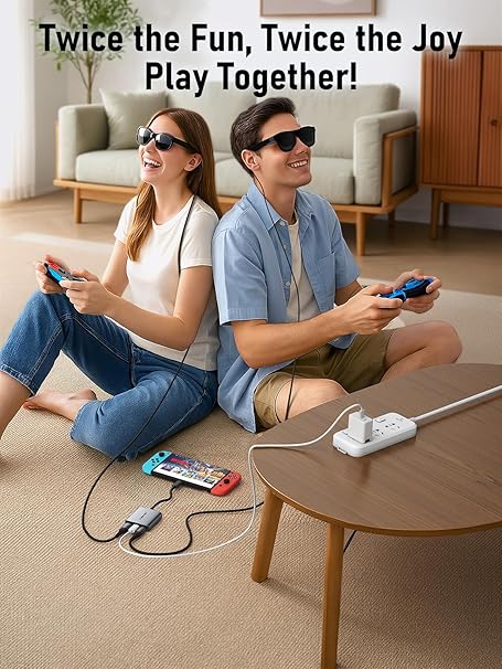 Two people playing video games together in a living room with text 'Twice the Fun, Twice the Joy Play Together!'.
